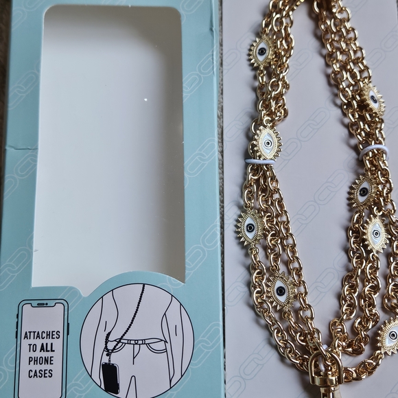 Accessories - NEW.IN BOX Gold Evil Eye Phone Chain